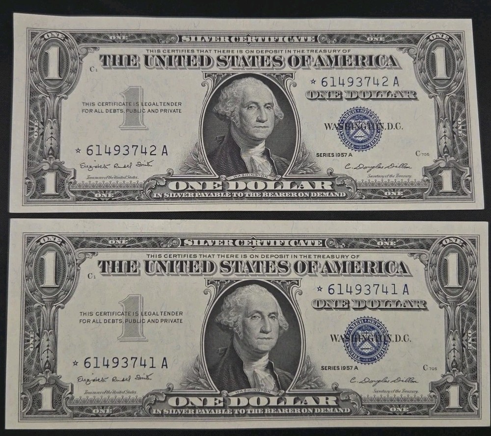 1957-A  2 consecutive silver cert. Dollars. Nice Unc Stars