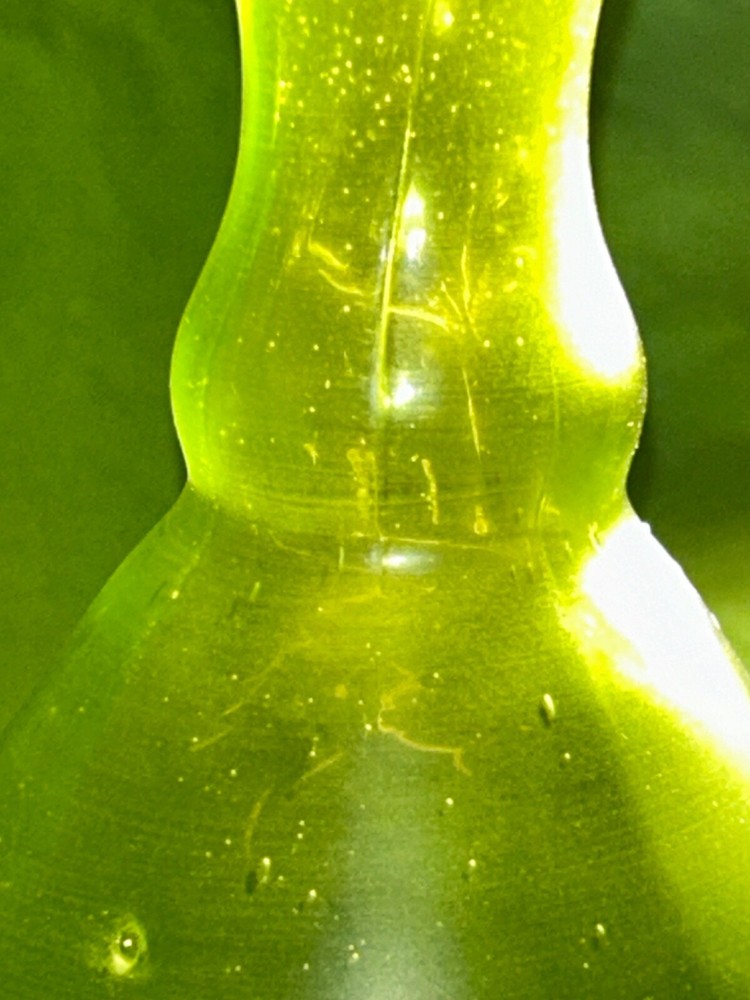 An Old Pontiled Satin Green Barber Bottle