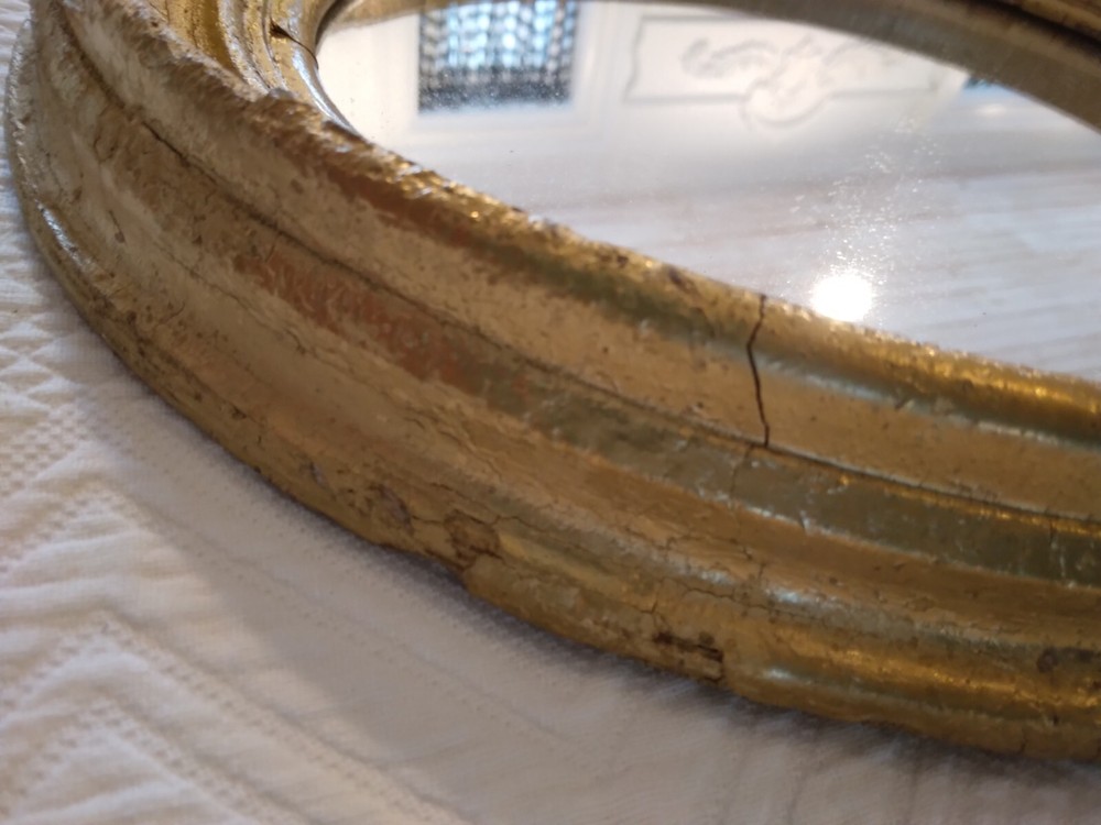 Antique Oval gilt Victorian mirror.