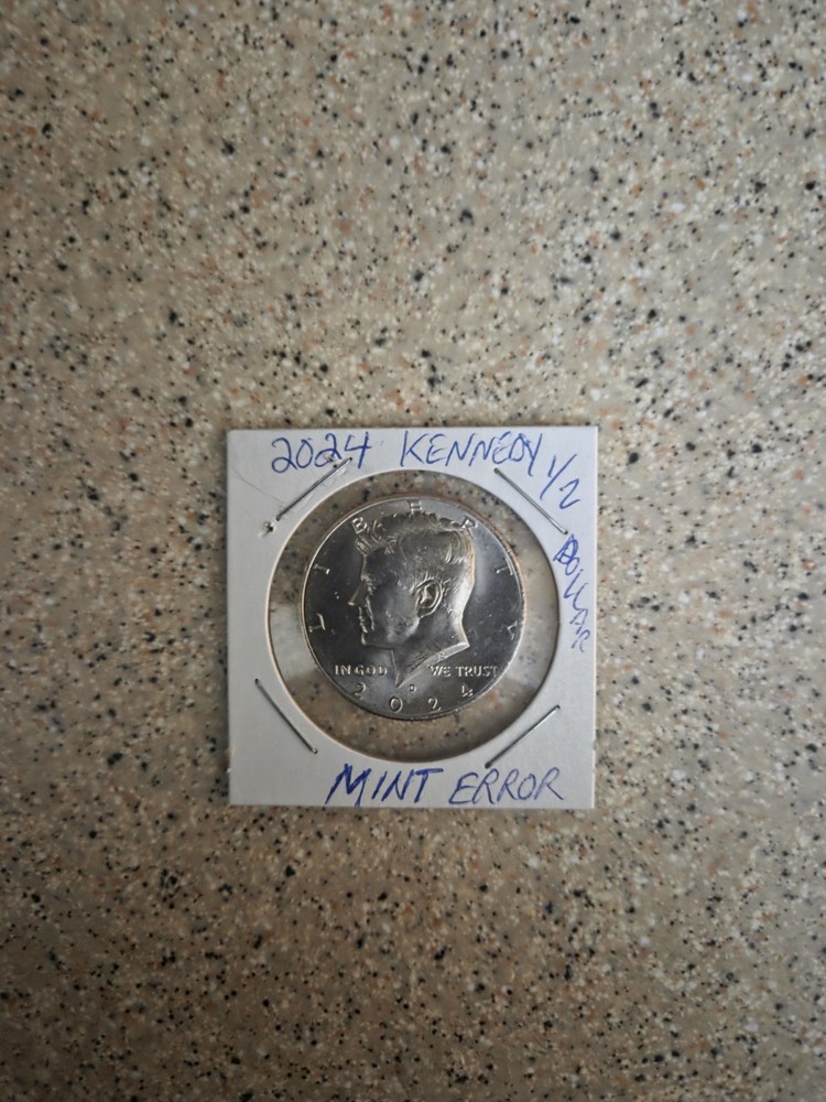 2024 kennedy half dollar with 3 holes in face Errors