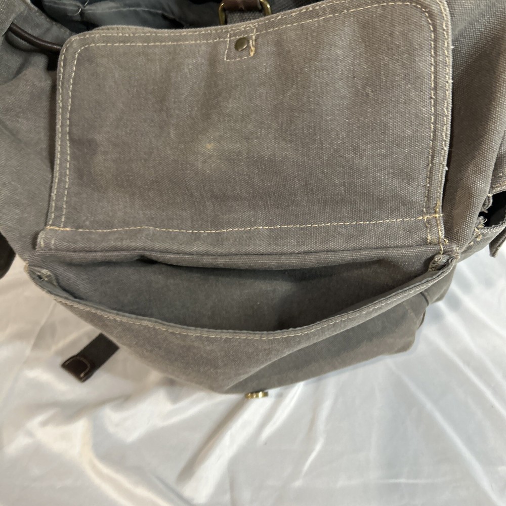 Cargoit Gray Canvas Backpack Magnetic Closures Pockets Straps and A Deep Inside