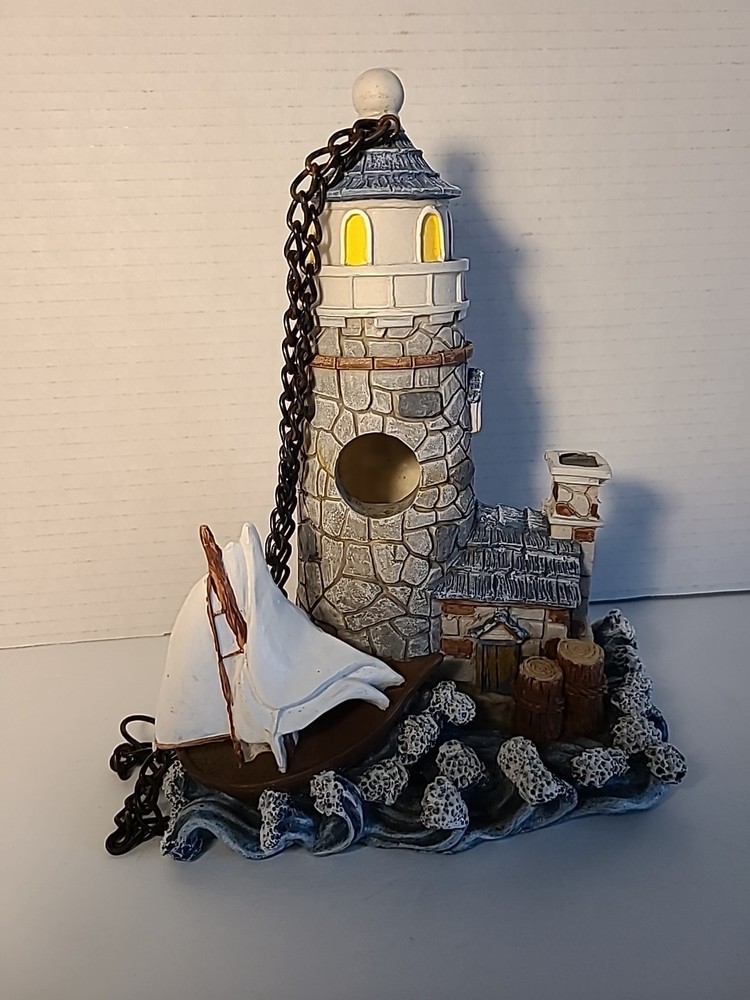 Graystone Lighthouse Sailboat And Waves With Hanging Chain