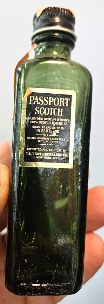 Passport Scotch empty 1/10th pint glass bottle stayed internationally buzzed