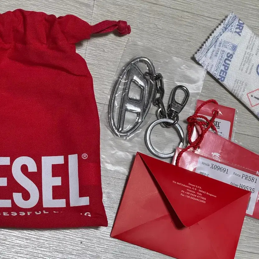 DIESEL Holy C Logo Silver Keyring - Gently Used, Authentic