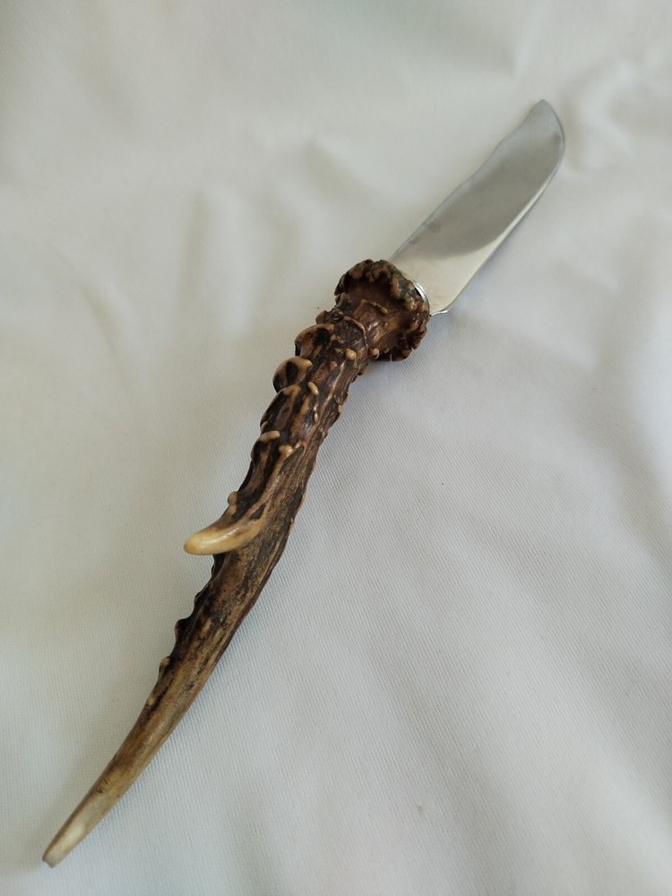 Vintage knife with deer horn handle