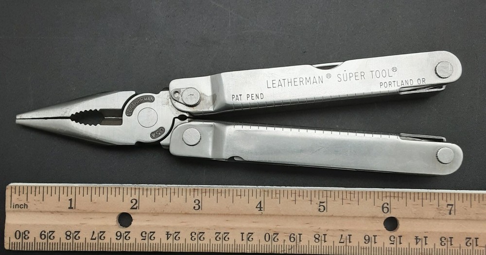 Stainless LEATHERMAN Super Tool Folding Pocket Knife/Multi-Tool