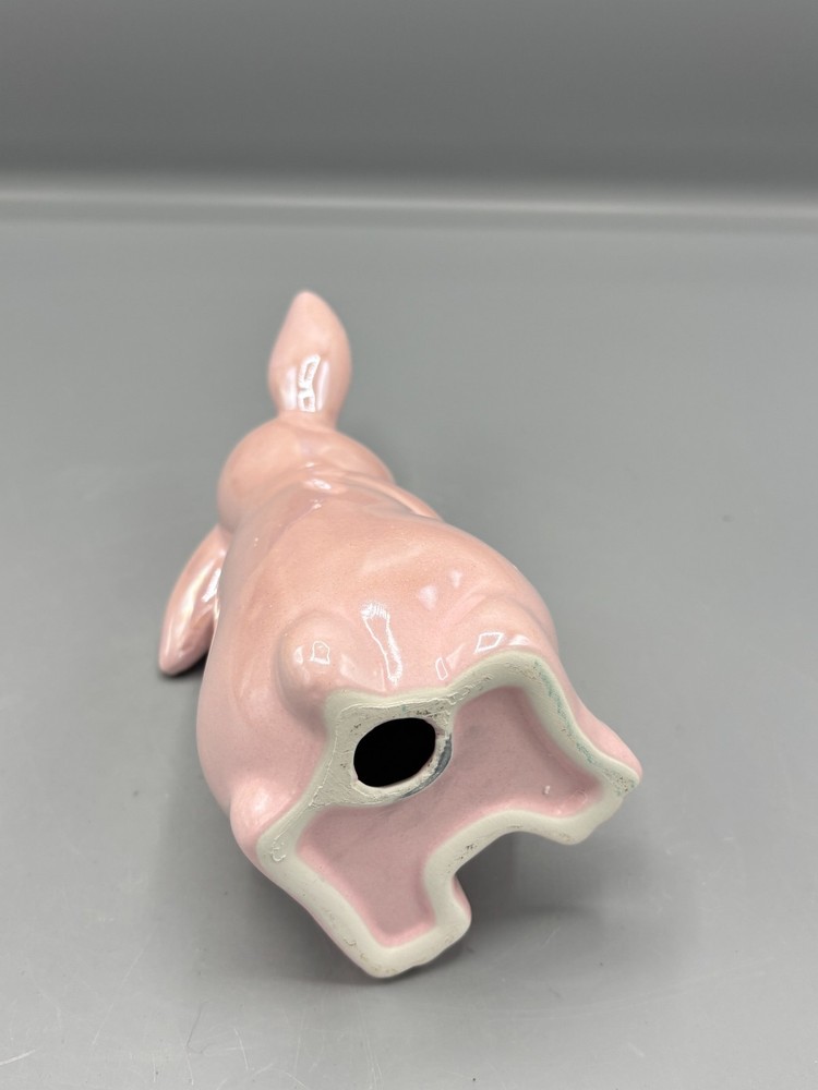 Glossy pink ceramic Easter bunny with carrot
