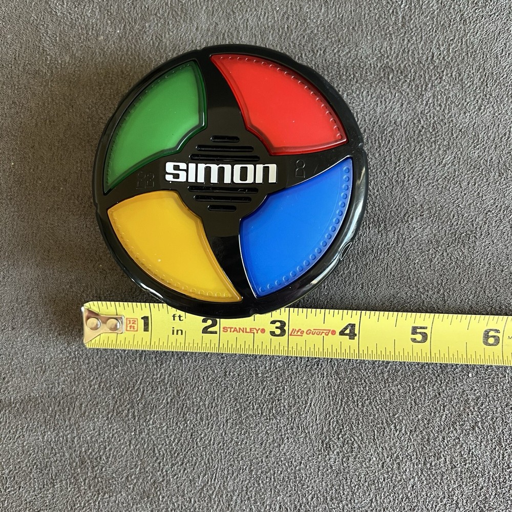 Hasbro Simon Micro Series Electronic Handheld Game. Tested, Works Great Clean