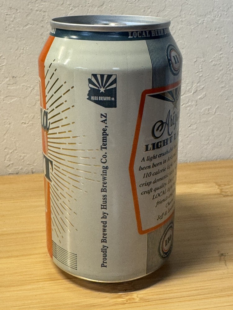 Arizona Light Lager - Huss Brewing - Empty Beer Can Bottom Opened