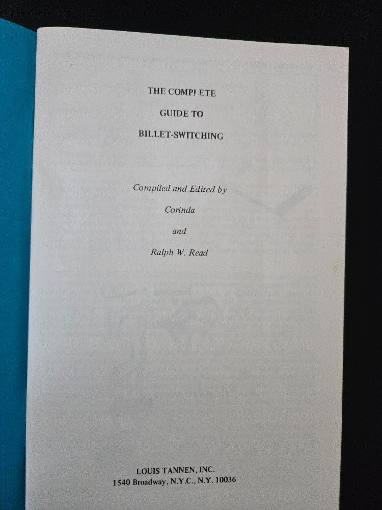 Two books on mentalism with billets