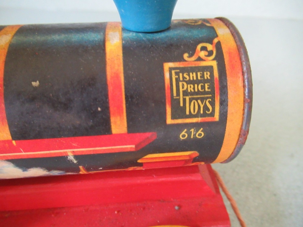 Wooden Chuggy Pop-up train engine pull toy