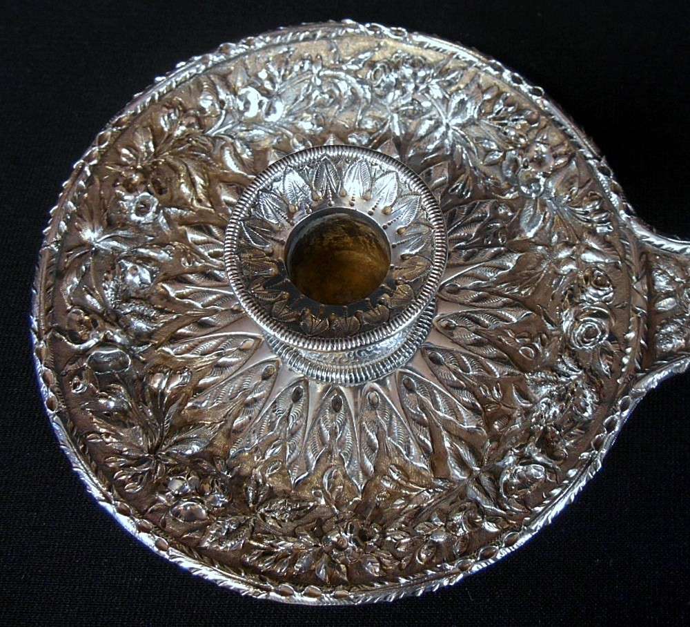 A rare repousse solid silver chamberstick, 11oz mark, S.Kirk & Son c.1886-96