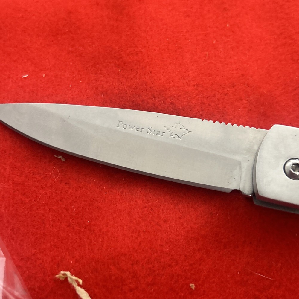 Vintage Power Star Folding Lockback Knife with Compass on handle