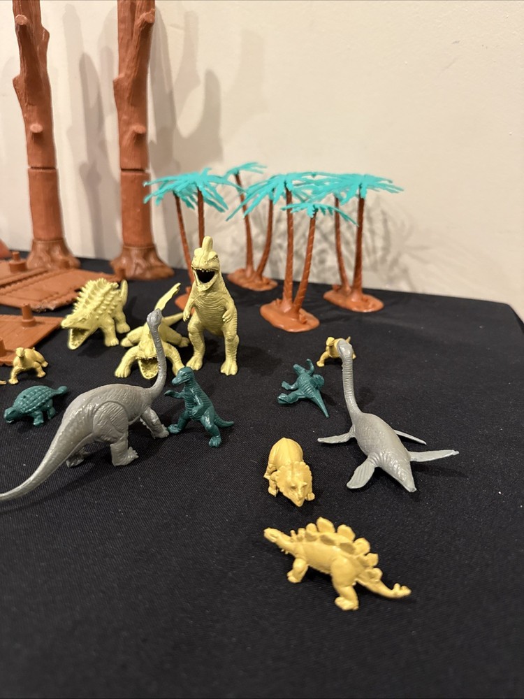 Dinosaur Approximately 37 Figures Plus Trees ( Missing Parts) READ