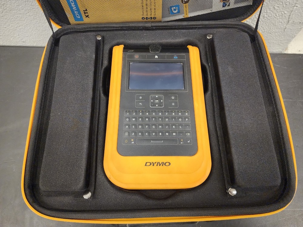 Dymo XTL 500 Label Maker bundle W/Case, Charger Owners Manual.