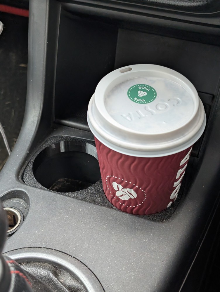 Cup holder insert for Suzuki Swift 2005-2010.