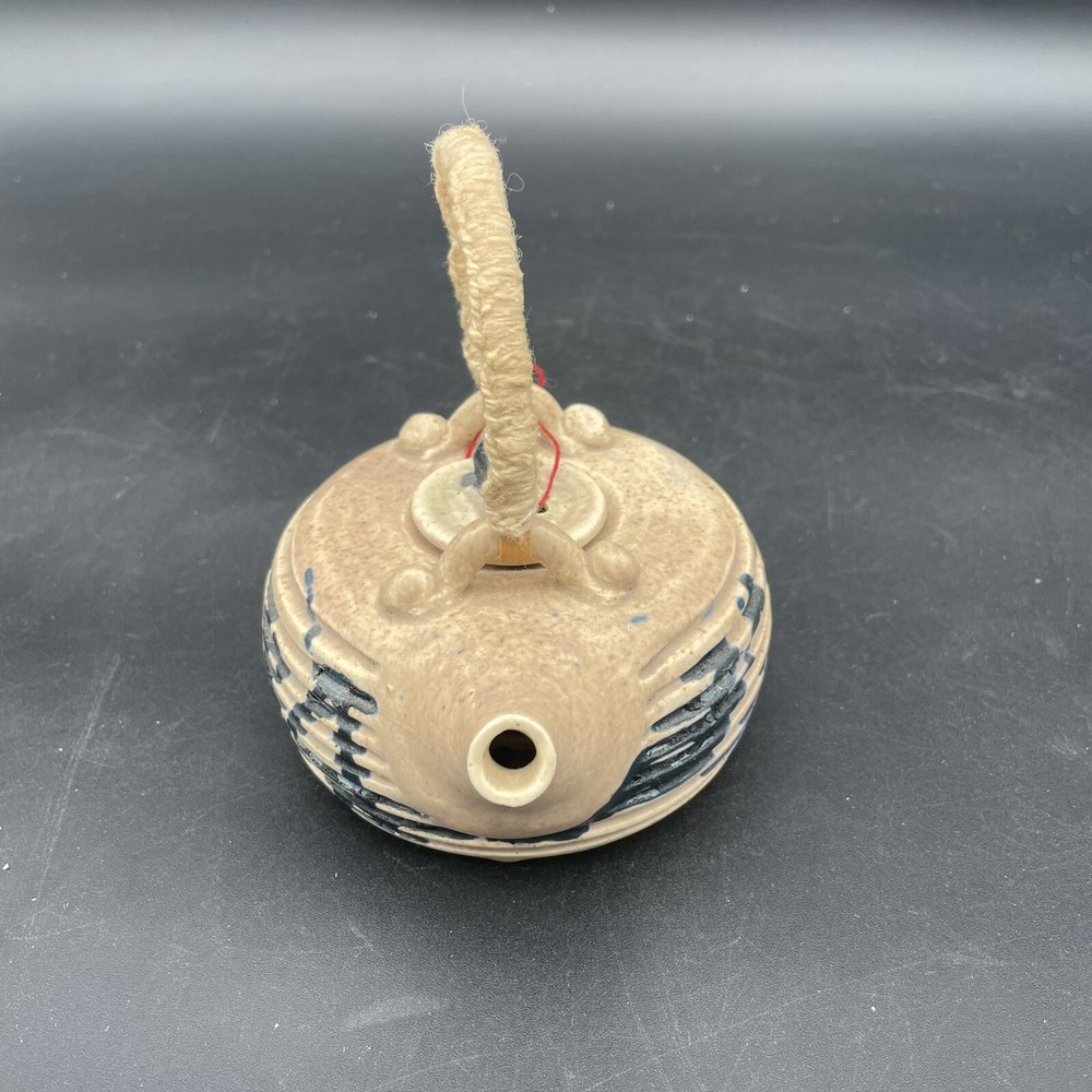 Small Tea Pot Blue & White Pottery w/ Yarn Handle.