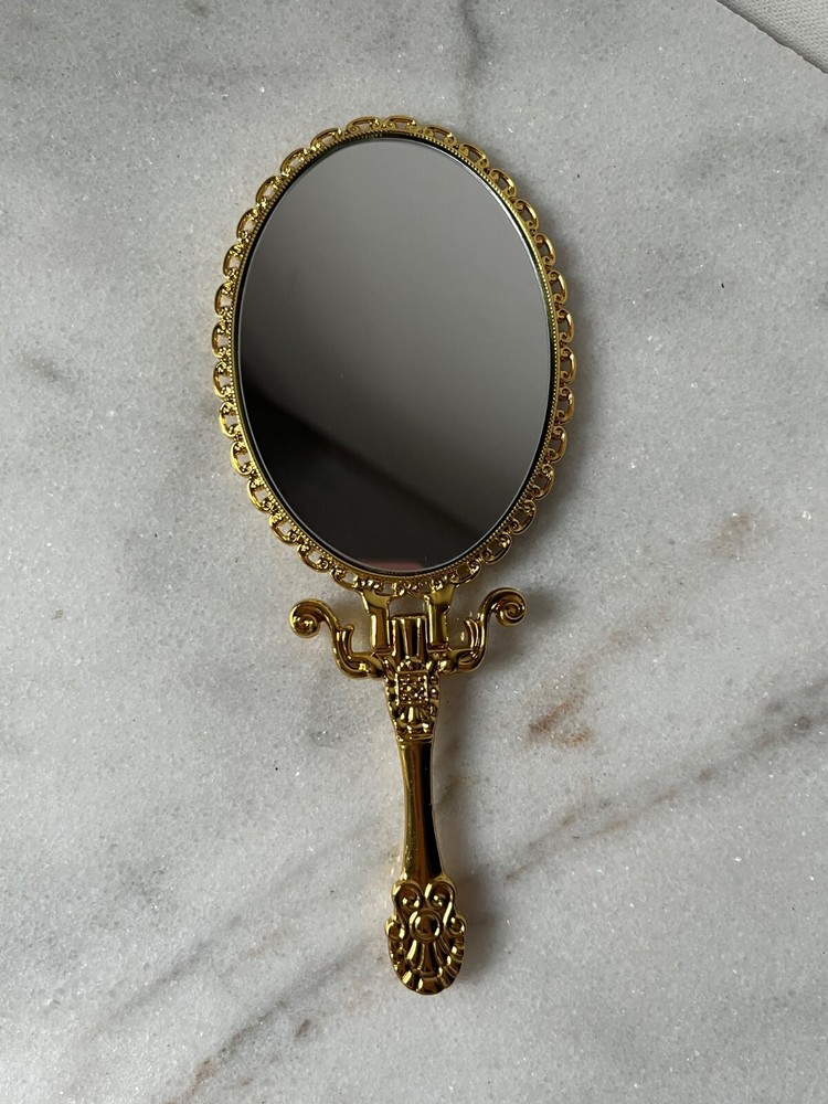 Izzy and Liv gold Fold Away Hand Mirror adjustable