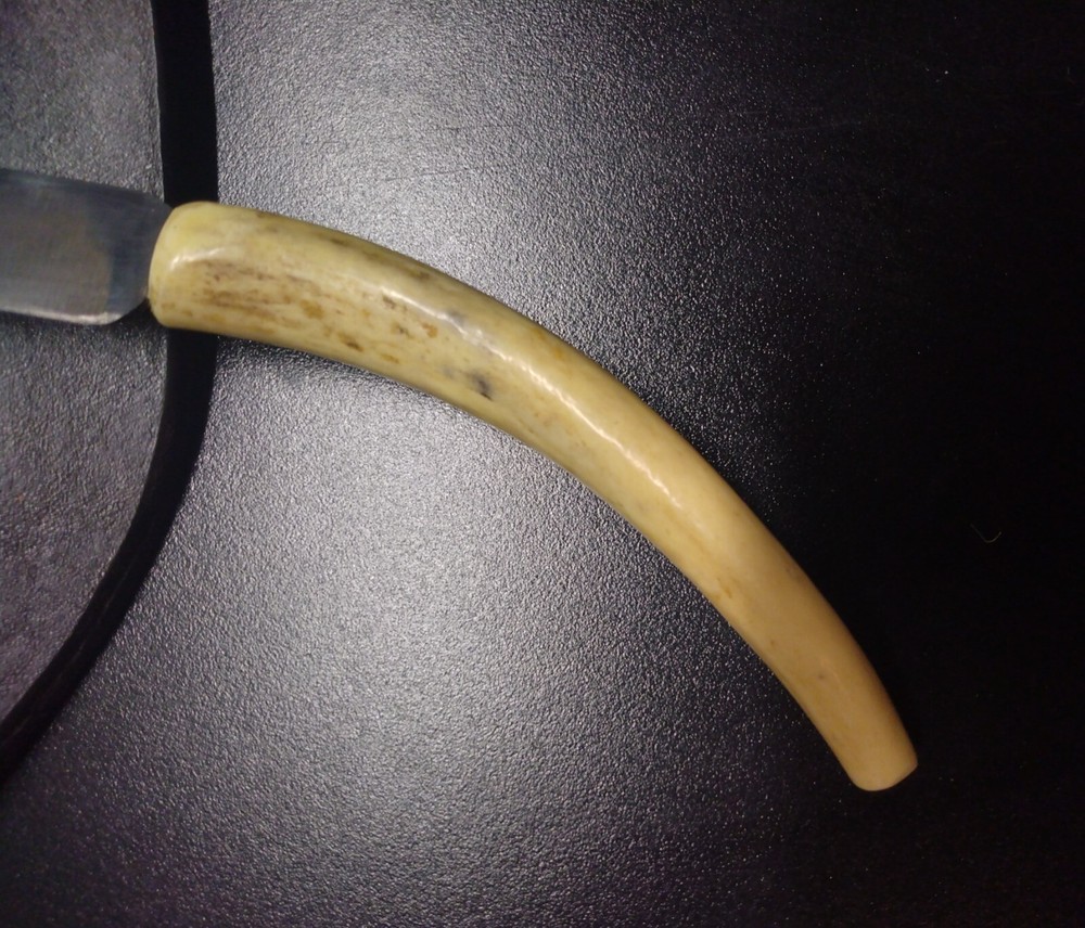 Unique handmade 8" knife in leather sheath