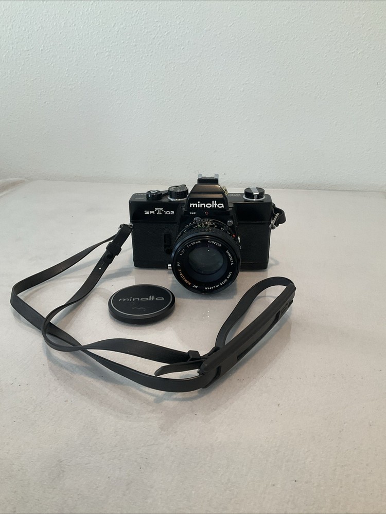 Minolta SRT 102/Black with 50/1.7 — LOOK