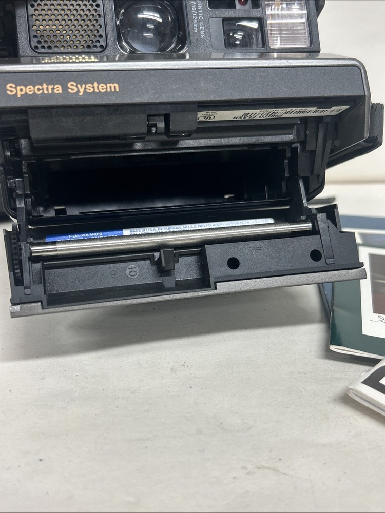 Vintage Polaroid Spectra System Camera With Manuals UNTESTED