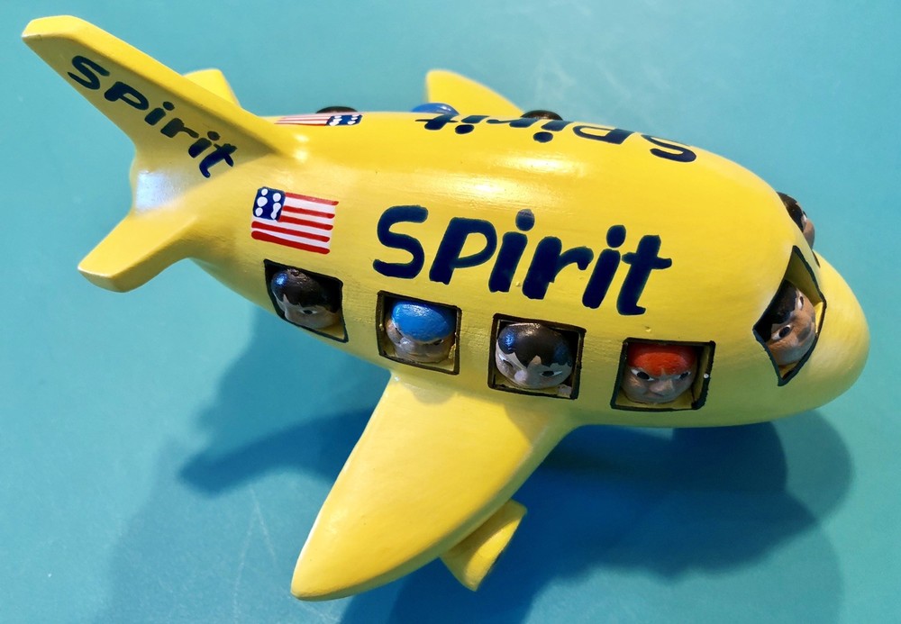 SPIRIT AIRLINES HAND PAINTED CERAMIC PLANE