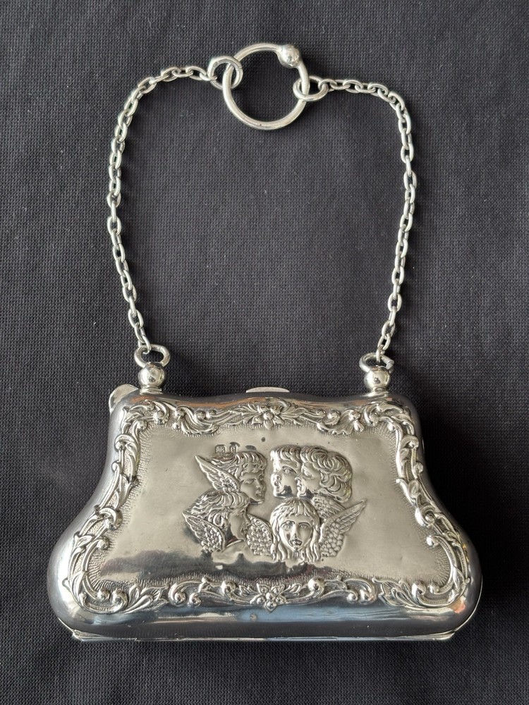 Reynolds Angels Solid Silver Purse,  Henry Matthews 1904.