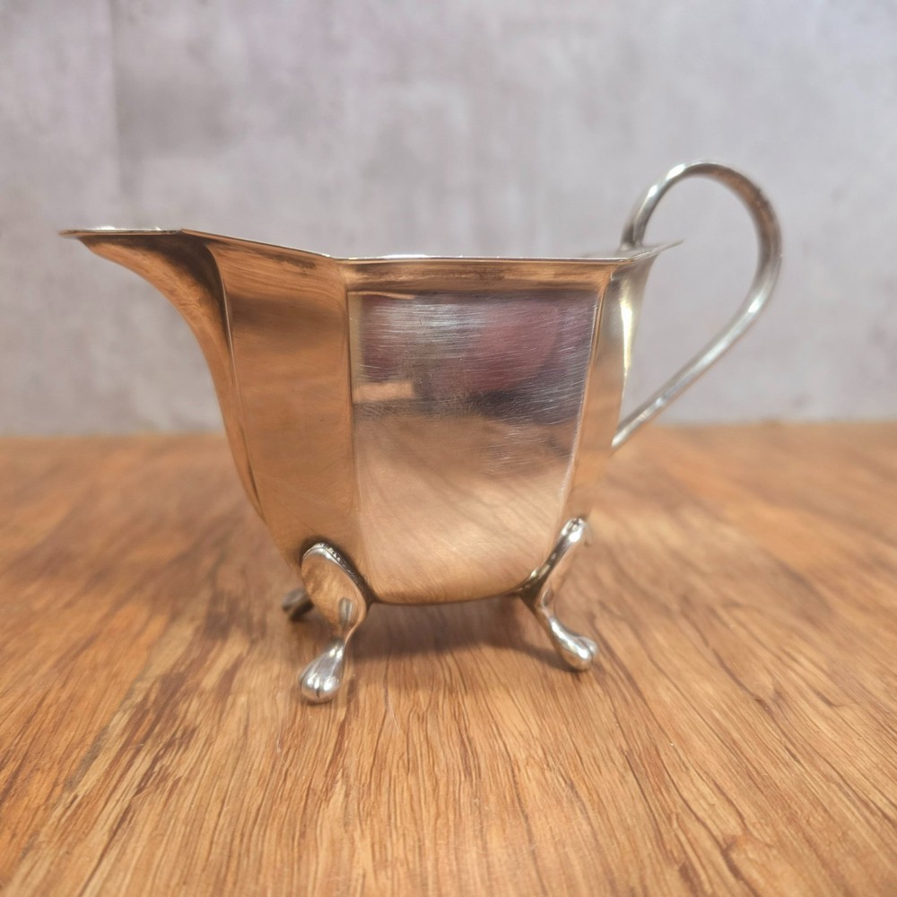 Early Art Deco Three Piece Sheffield Silver Plate Tea Set, Ebonised Handle. Prop