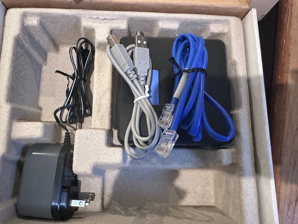 Linksys CM100 Cable Modem w/Ethernet Connections - REFURBISHED