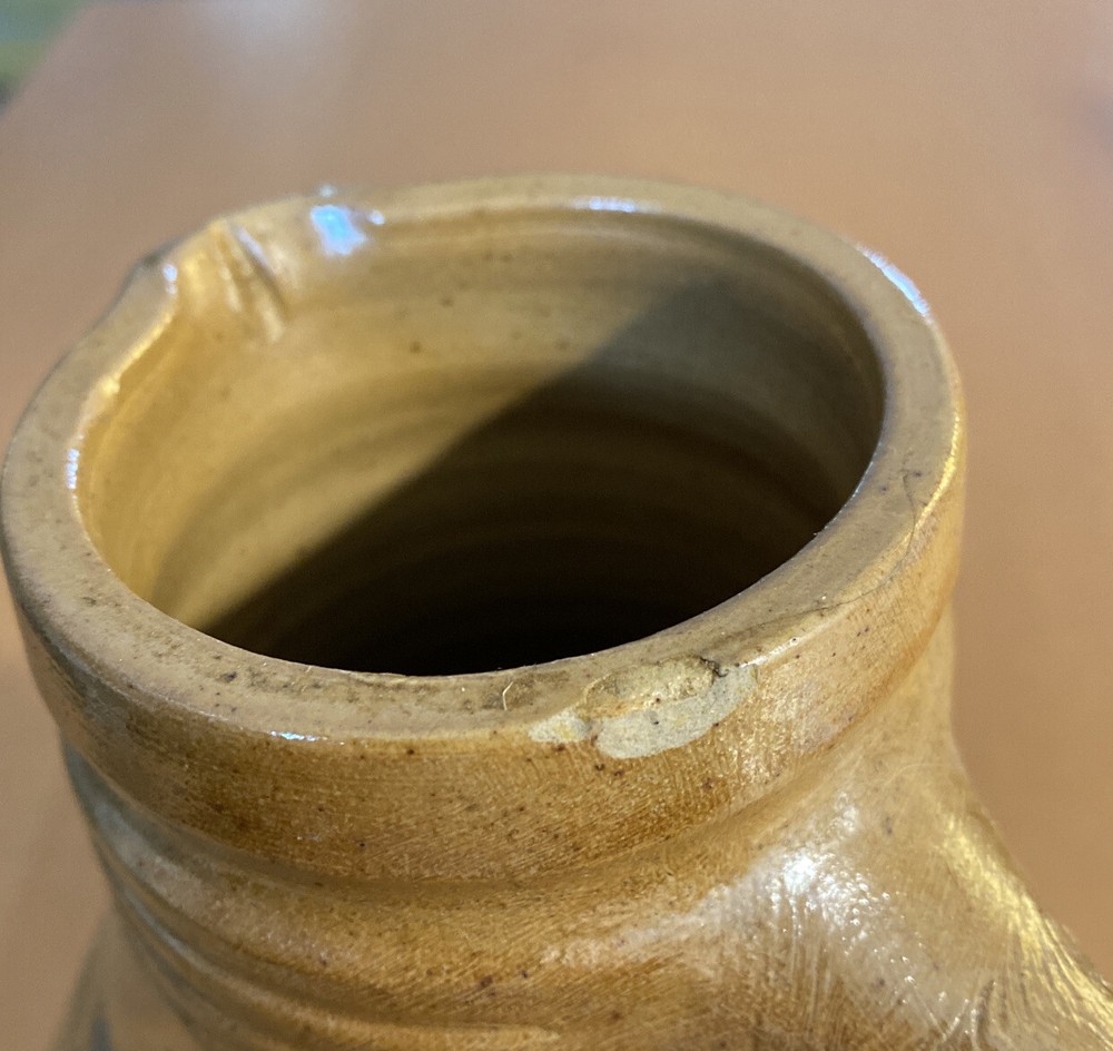 Shiny Brown Pottery Pitcher With Flower Design (Chipped-See Description)