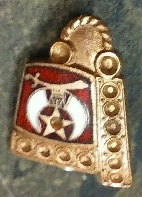 2 Shriner pins one with defect