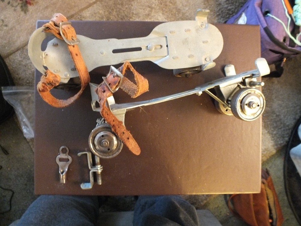 antique roller skates a pair