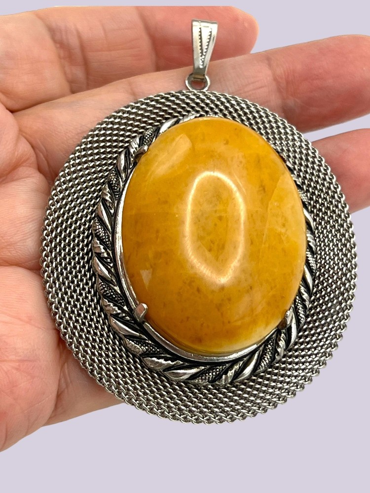 Yellow Calcite Stone Pendant – mesh design stainless steel