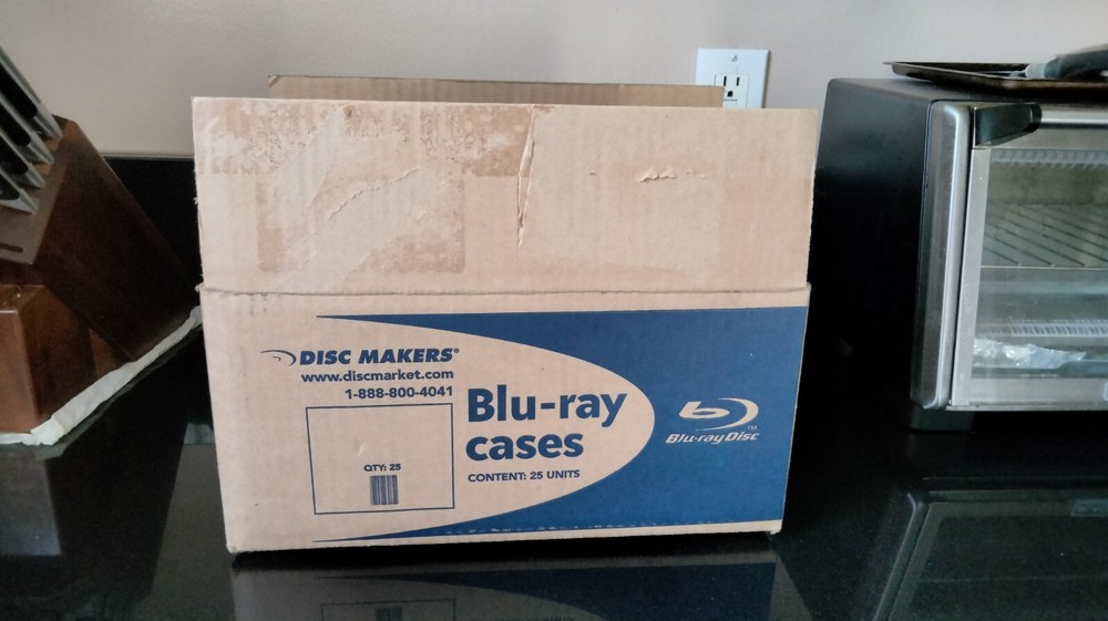 BOX OF 25 BLU-RAY CASES (UNUSED)