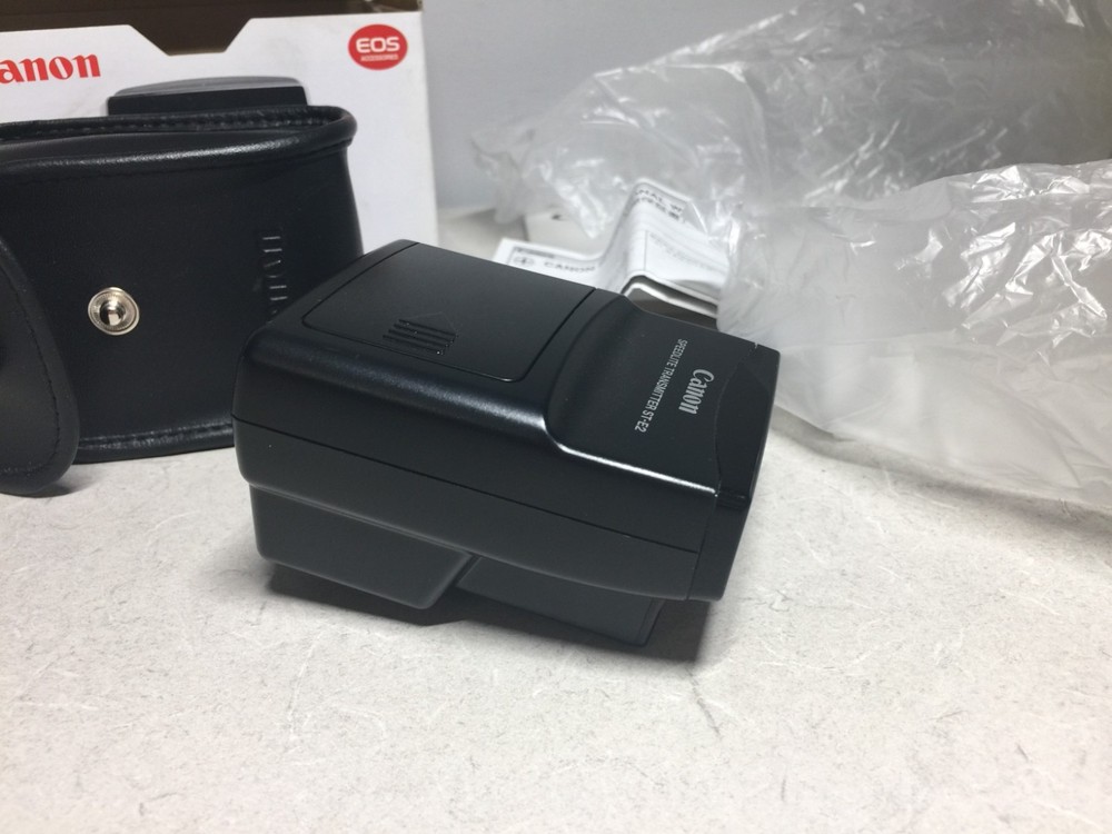 Canon Speedlite Transmitter ST-E2 manual EOS accessory shoe mount flash trigger