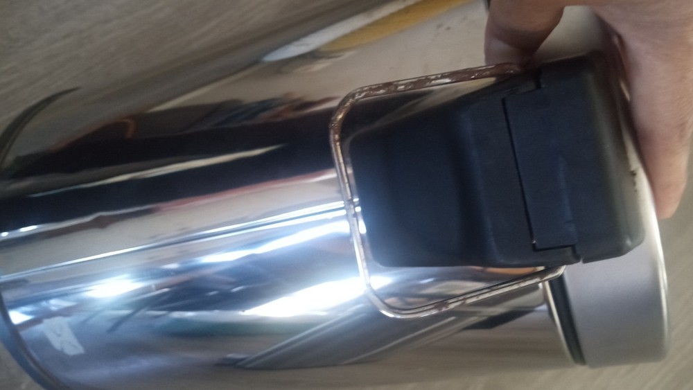 Small gray trash can