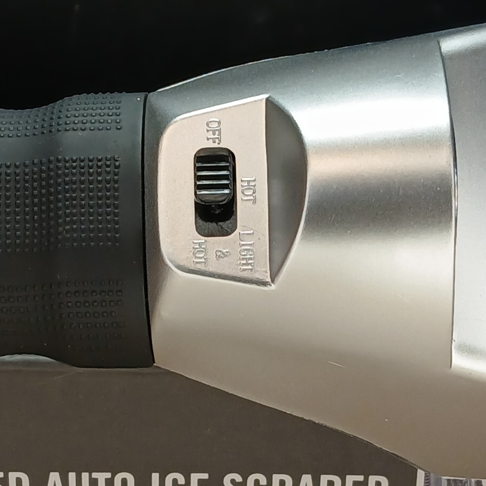 Totes Heated Auto Ice Scraper with a built-in flashlight.