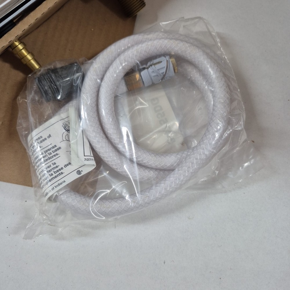 Delta Two Handle Kitchen Faucet With Veggie Spray 2457