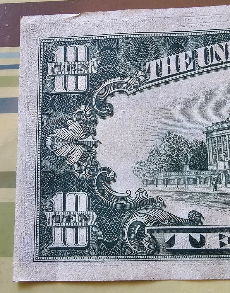 $10 bill 1969c off center front and back with seal misalignment error