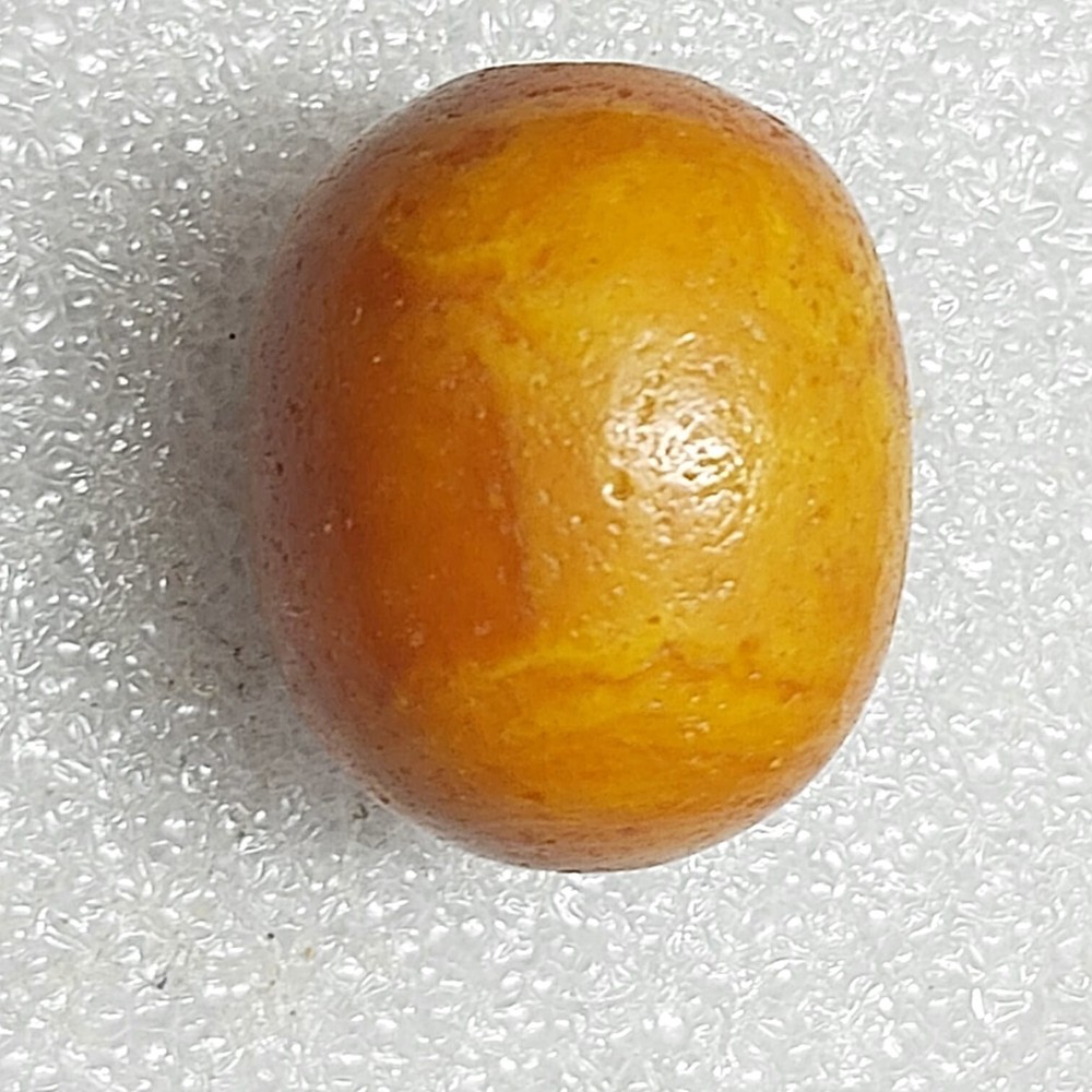 Ancient large amber cabochon bead