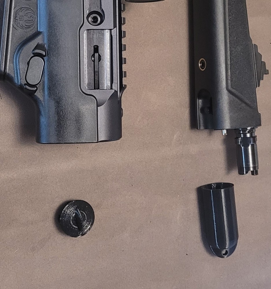 Ruger PC Carbine dirt and sand protector for barrel lug and receiver socket.