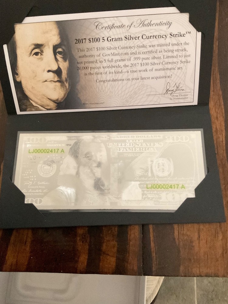 2017 $100.00 5 gram currency strike with pen.
