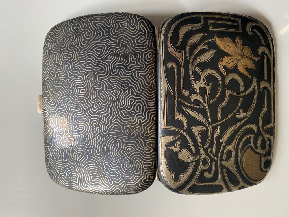 vintage silver cigarette case with gold inlay