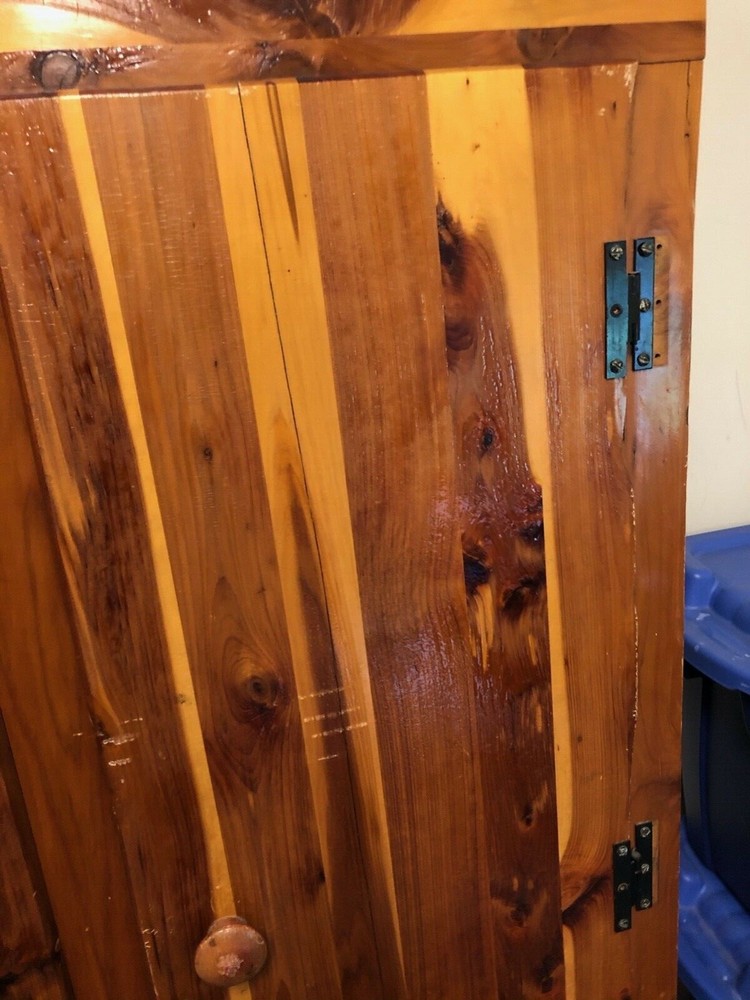 cedar wardrobe with hanging bar, 2 latching doors, good condition