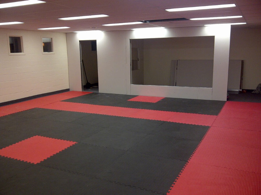 red mixed martial arts grappliing interlocking floor puzzle mat system