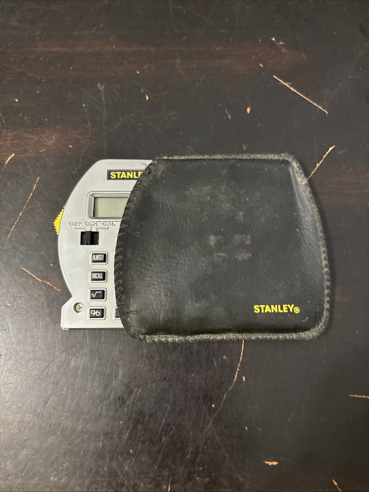 Vintage STANLEY TOOLS Powerlock Calculator/Clock Combination with Leather Case.