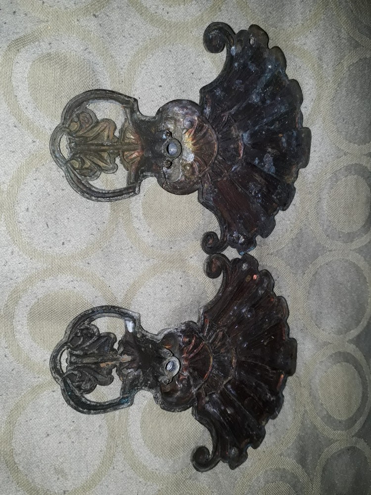 antique brass curtain tie backs shell shape needs a polish