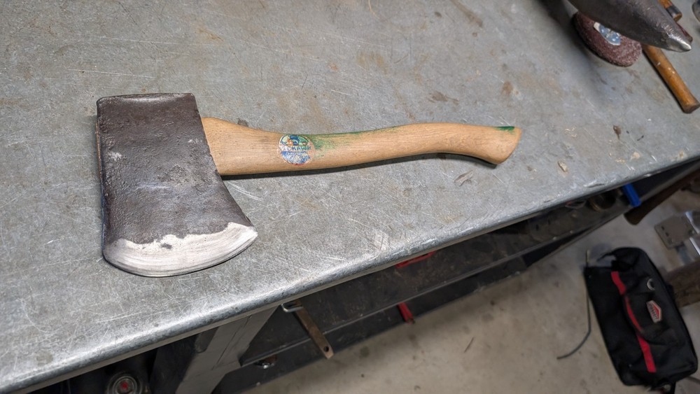 Kelly works axe and tool
