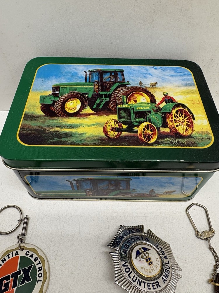 32 Vintage Key Chains And a John Deere Tin Box