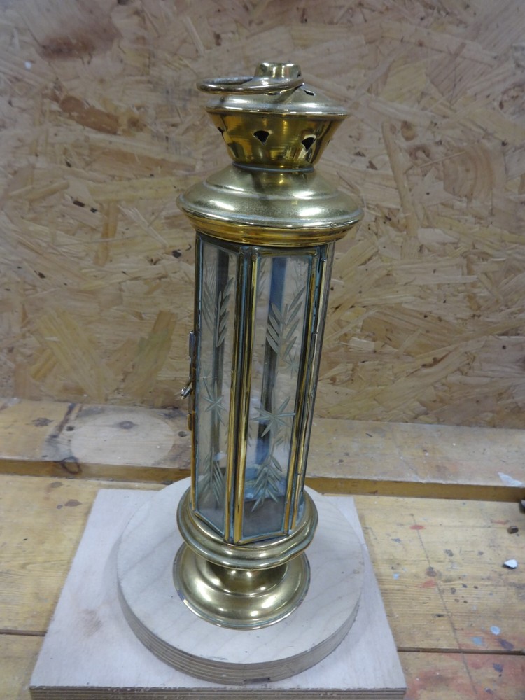 A Brass Candle Lamp.